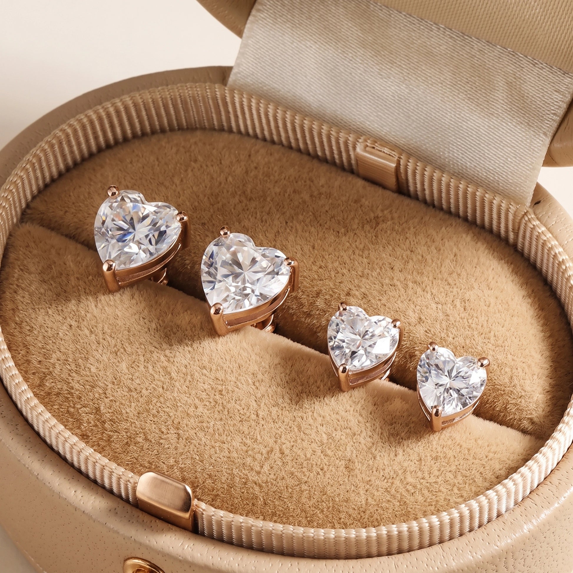 Rose gold heart cut moissanite stud earrings in a jewelry gift box - Sensitive Stones