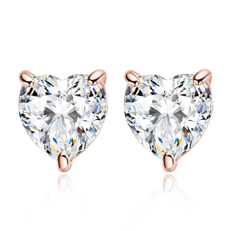 Rose gold heart cut moissanite stud earrings on a white background - Sensitive Stones