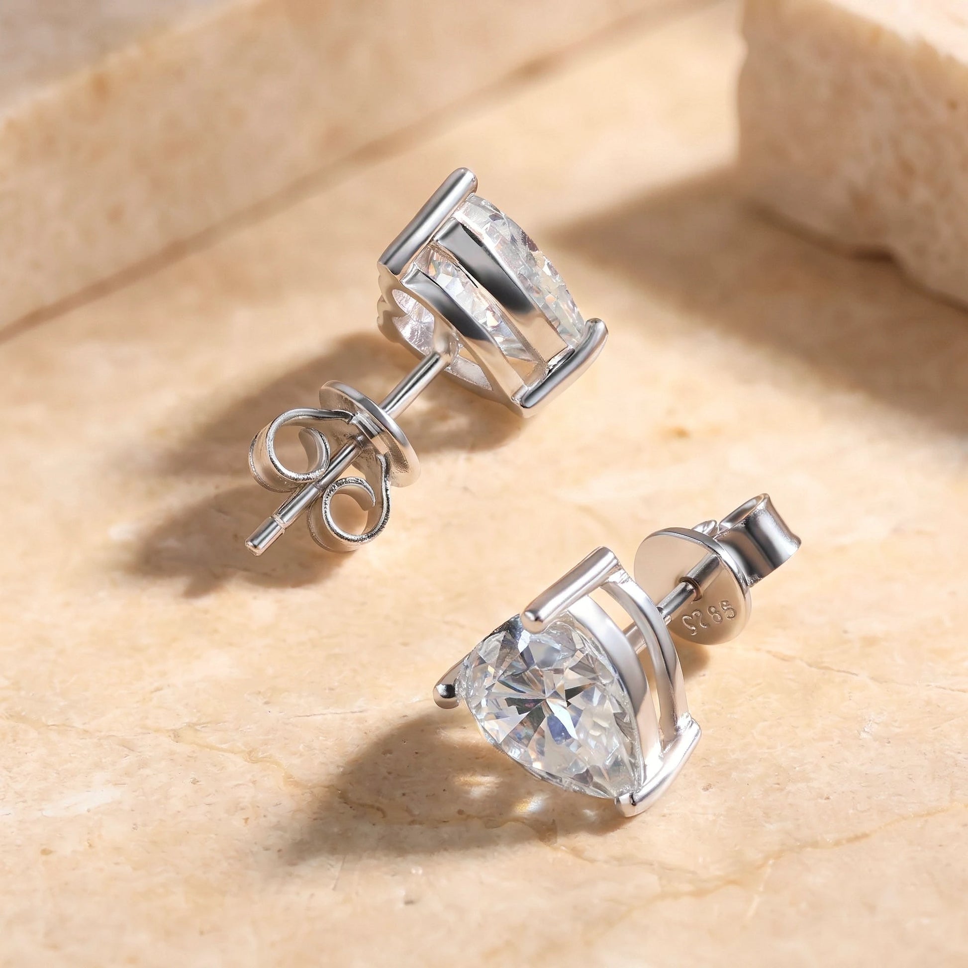 White gold heart cut moissanite stud earrings, three prong setting and butterfly back detail - Sensitive Stones