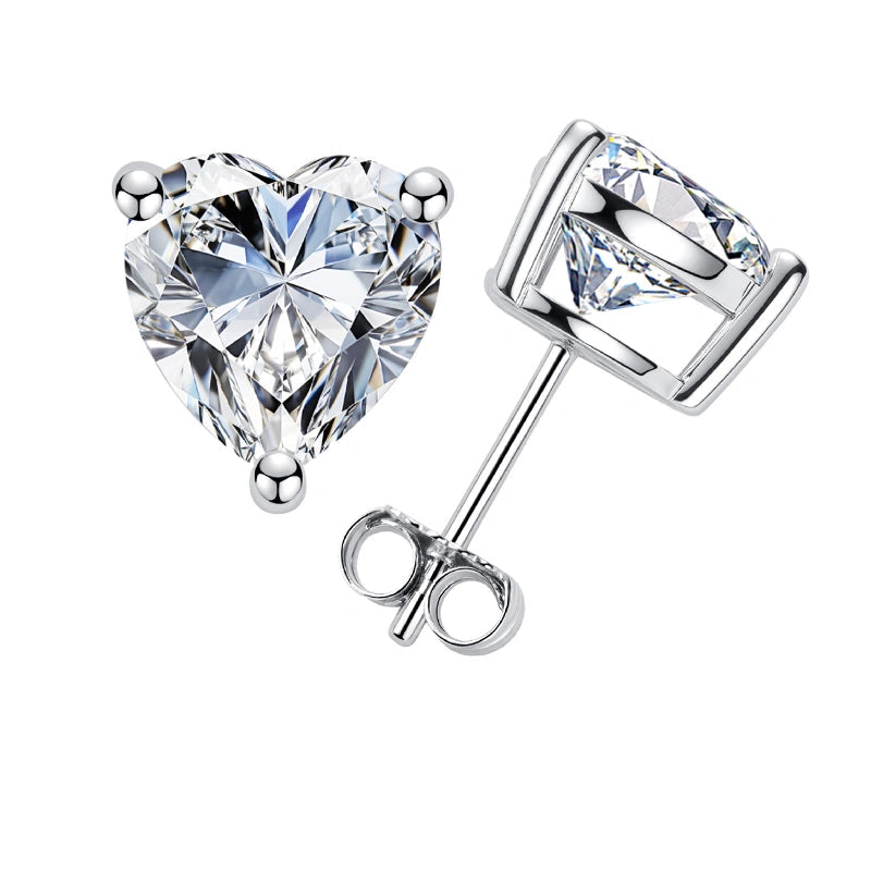 White gold heart cut moissanite stud earrings on a white background - Sensitive Stones