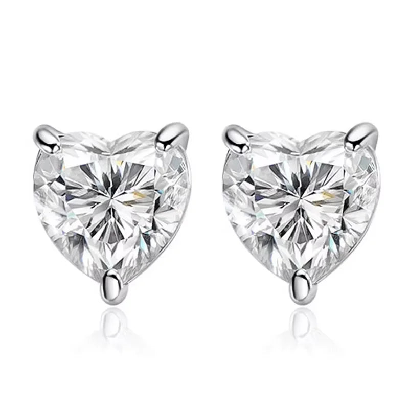 White gold heart cut moissanite stud earrings on a white background - Sensitive Stones