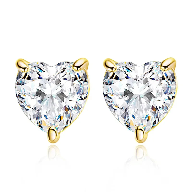 Heart cut moissanite stud earrings with 18K yellow gold prongs on a white background, front view - Sensitive Stones