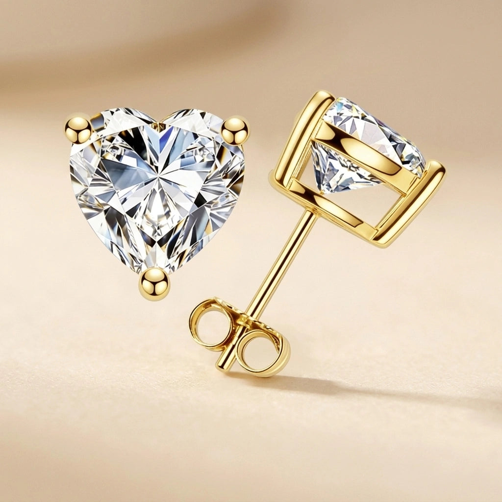 Heart cut moissanite stud earrings in 18K yellow gold, front and side view of the solitaire studs - Sensitive Stones