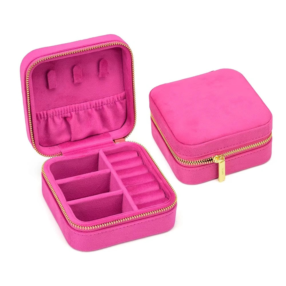 Hot pink velvet travel jewelry box open and closed showing ring rolls and earring compartments - Sensitive Stones
