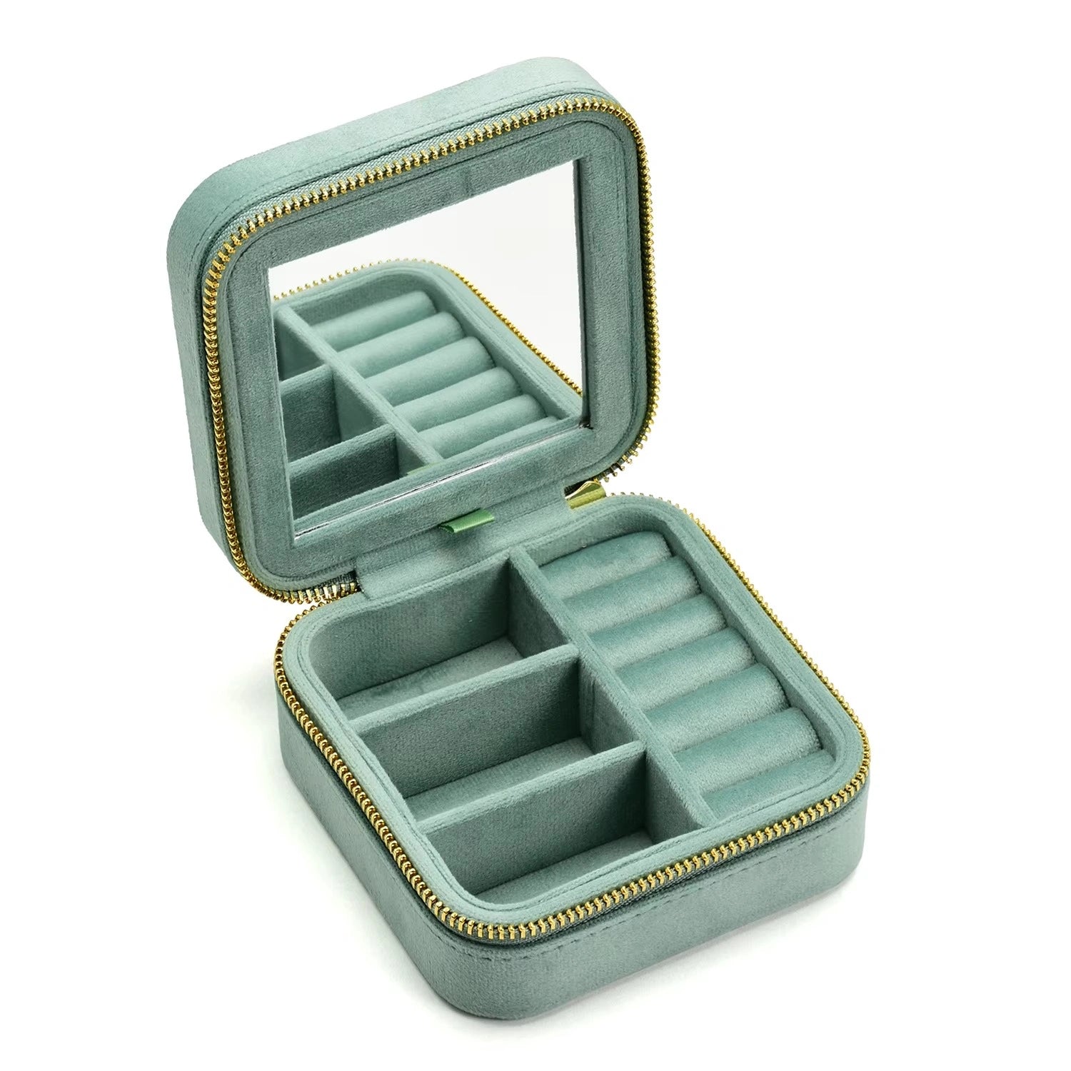 Mint velvet travel jewelry box open showing ring rolls and earring compartments with built-in mirror - Sensitive Stones