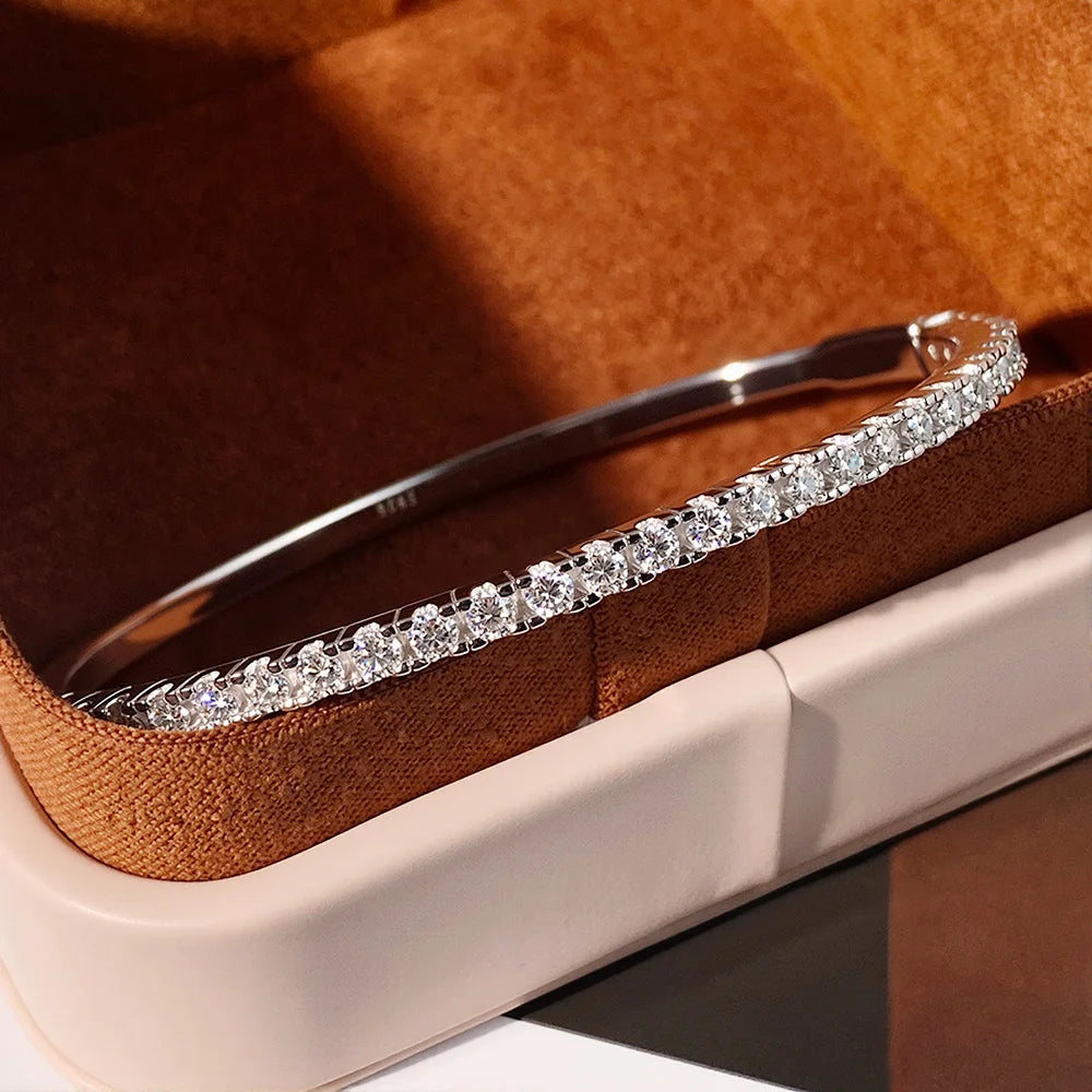 Moissanite bangle bracelet in solid 925 sterling silver, gold plated, shown inside jewelry box – Sensitive Stones