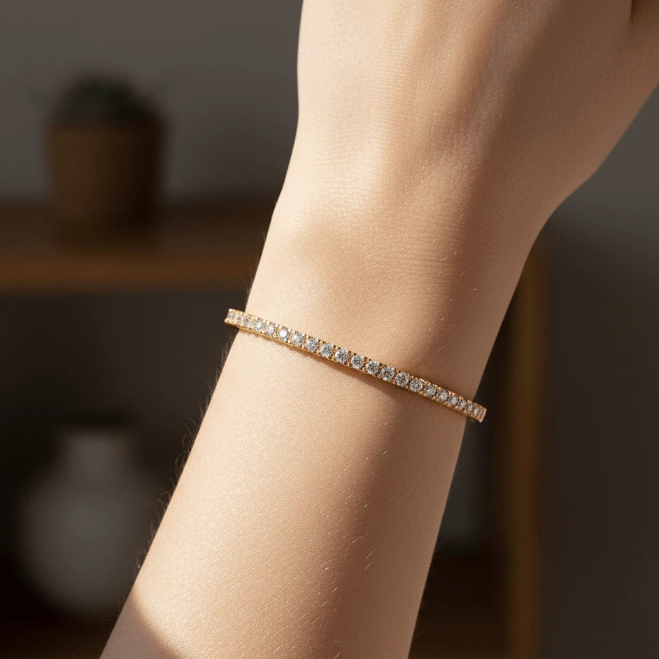 Rose gold moissanite bangle bracelet worn on model’s wrist in a natural lifestyle setting – Sensitive Stones