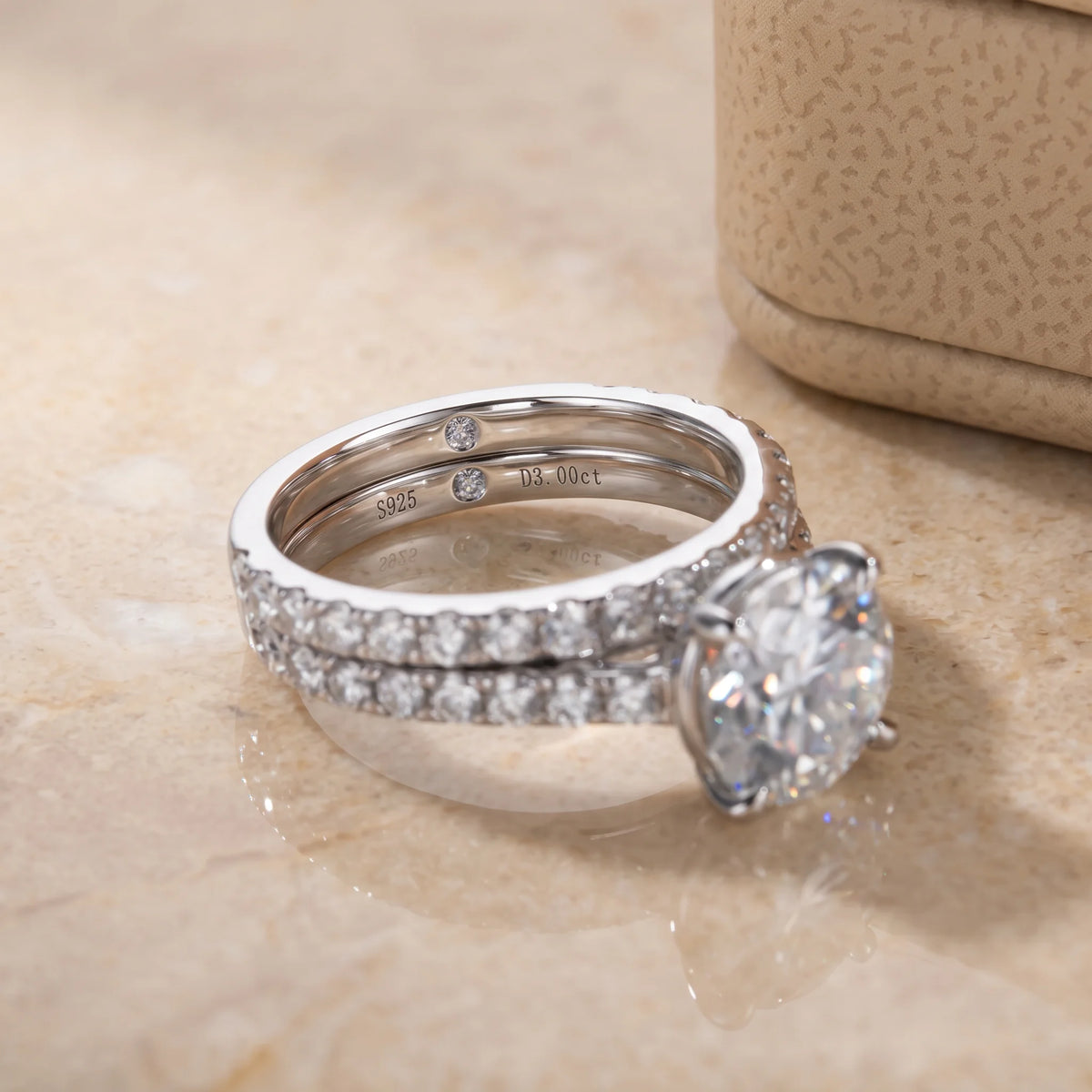 Moissanite bridal ring set side view showing S925 silver engagement ring and matching S925 wedding band with accent moissanite stones - Sensitive Stones