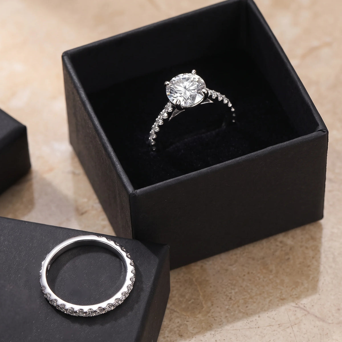 Moissanite bridal ring set 4-prong center stone with matching wedding band in black jewelry box - Sensitive Stones