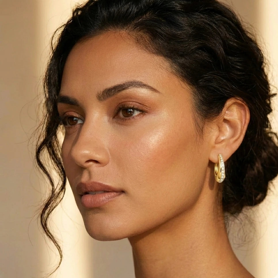 Moissanite chunky pavé hoop earrings in 18K gold plating worn on model lifestyle portrait shot - Sensitive Stones