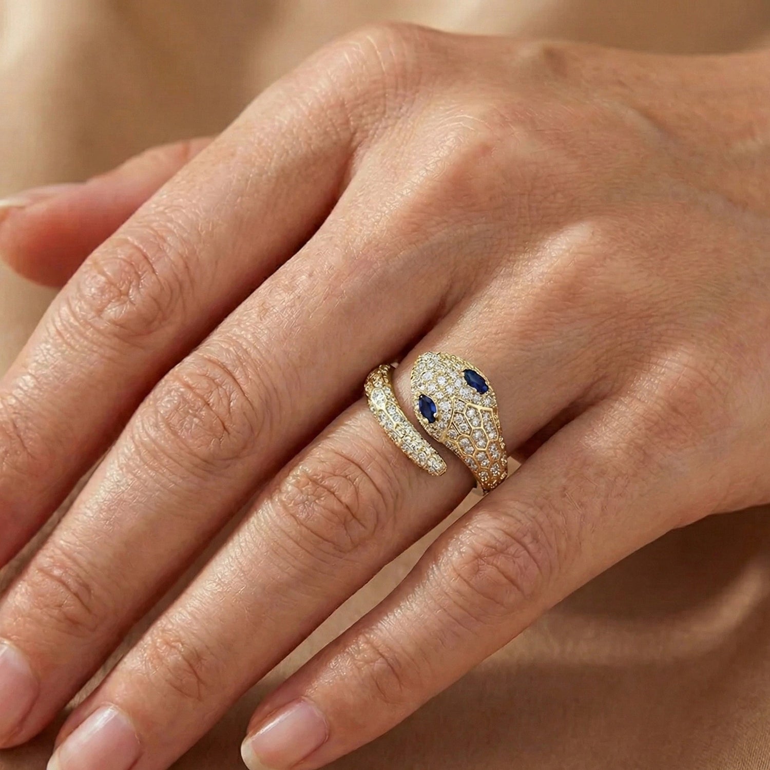 Moissanite Snake Ring worn on hand showing sculptural design and lab sapphire accents in white gold - Sensitive Stones