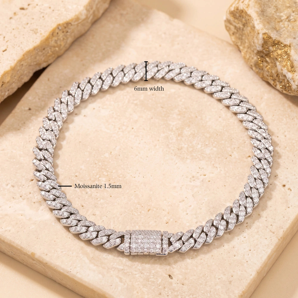 White gold 6mm moissanite Cuban link bracelet laid in a circle with labels showing the 6mm width and 1.5mm moissanite stones