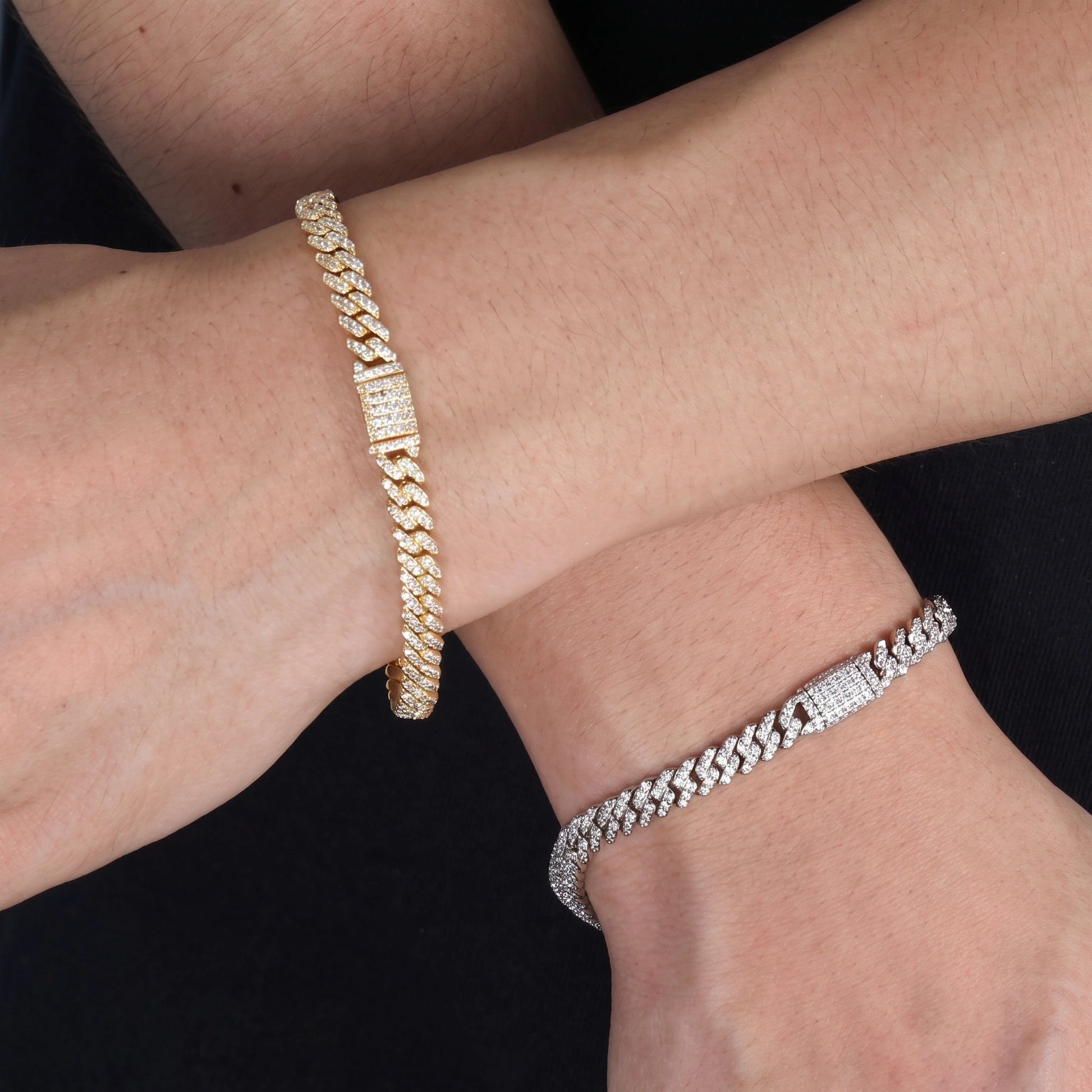 Yellow gold and white gold 6mm moissanite Cuban link bracelets worn side by side