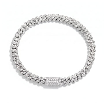6mm moissanite Cuban link bracelet in white gold laid flat, pave set on every link with a matching box clasp