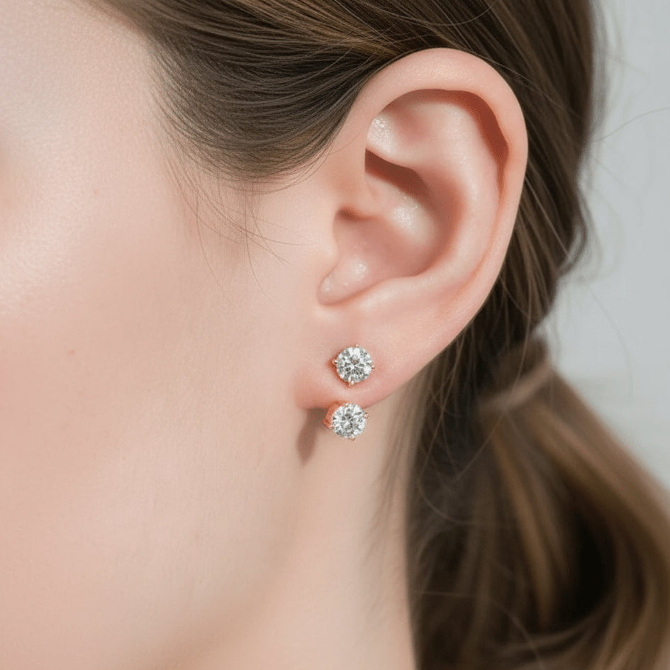 Sterling silver moissanite double stud jacket earrings in yellow gold plating shown on ear, elegant side view, unique front-back look - Sensitive Stones