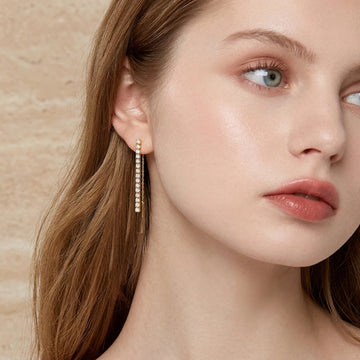 Moissanite drop dangle earrings in 925 sterling silver worn on model, elegant long line style with 0.9ct D color moissanite - Sensitive Stones