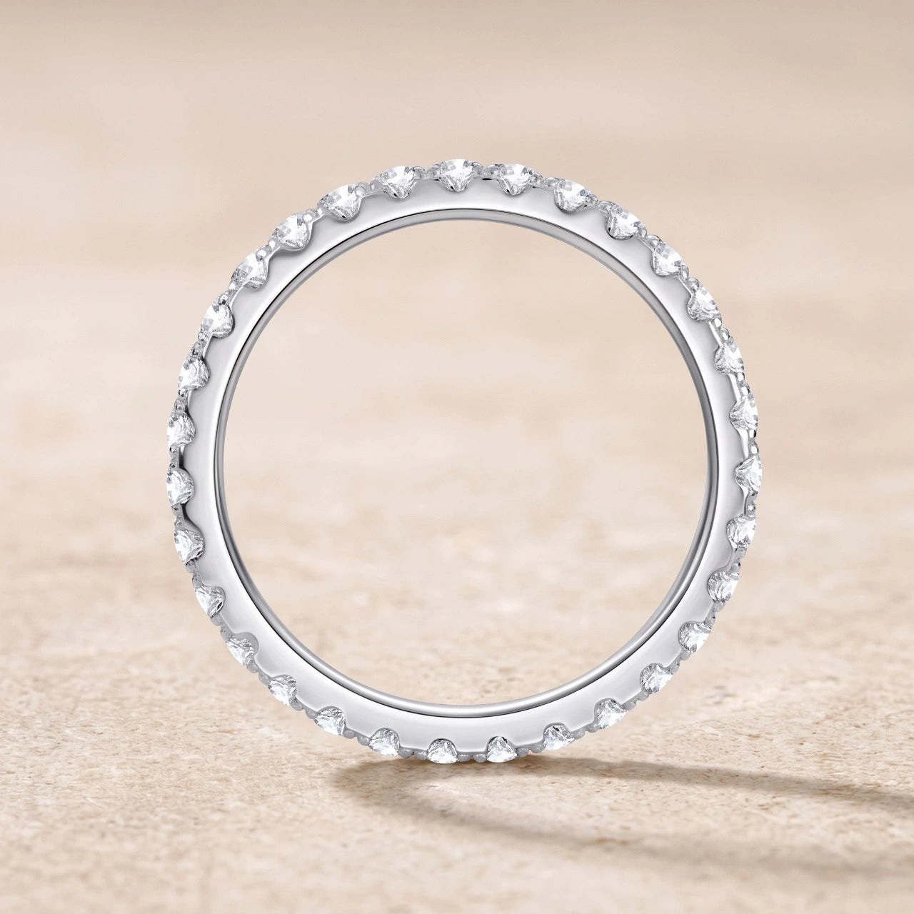 Top view of moissanite eternity ring with continuous round stones in 925 sterling silver setting – Sensitive Stones
