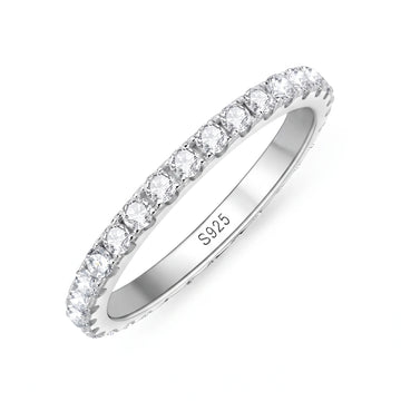 Moissanite full eternity ring in 925 sterling silver with a white gold finish showing VVS1 round stones in prong settings all around - Sensitive Stones