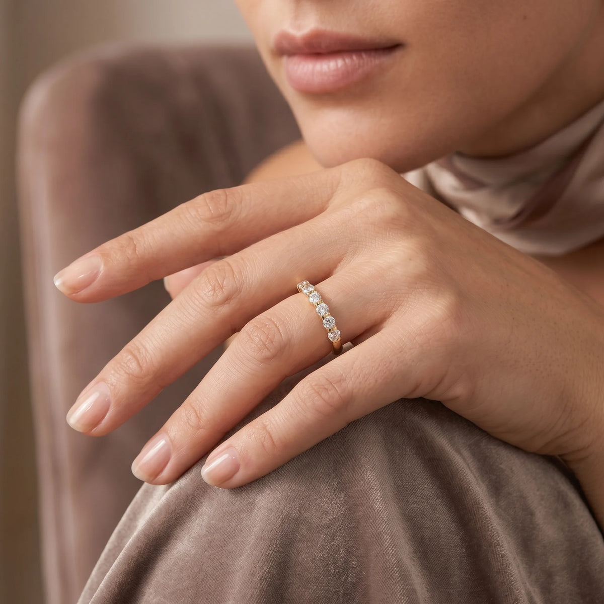 14K gold filled moissanite half eternity ring in yellow gold worn on the ring finger, lifestyle portrait - Sensitive Stones