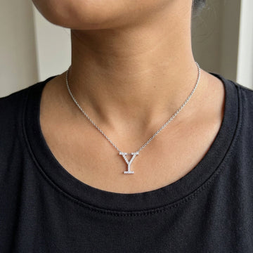 Moissanite initial necklace letter Y worn by Asian model black top natural light - Sensitive Stones