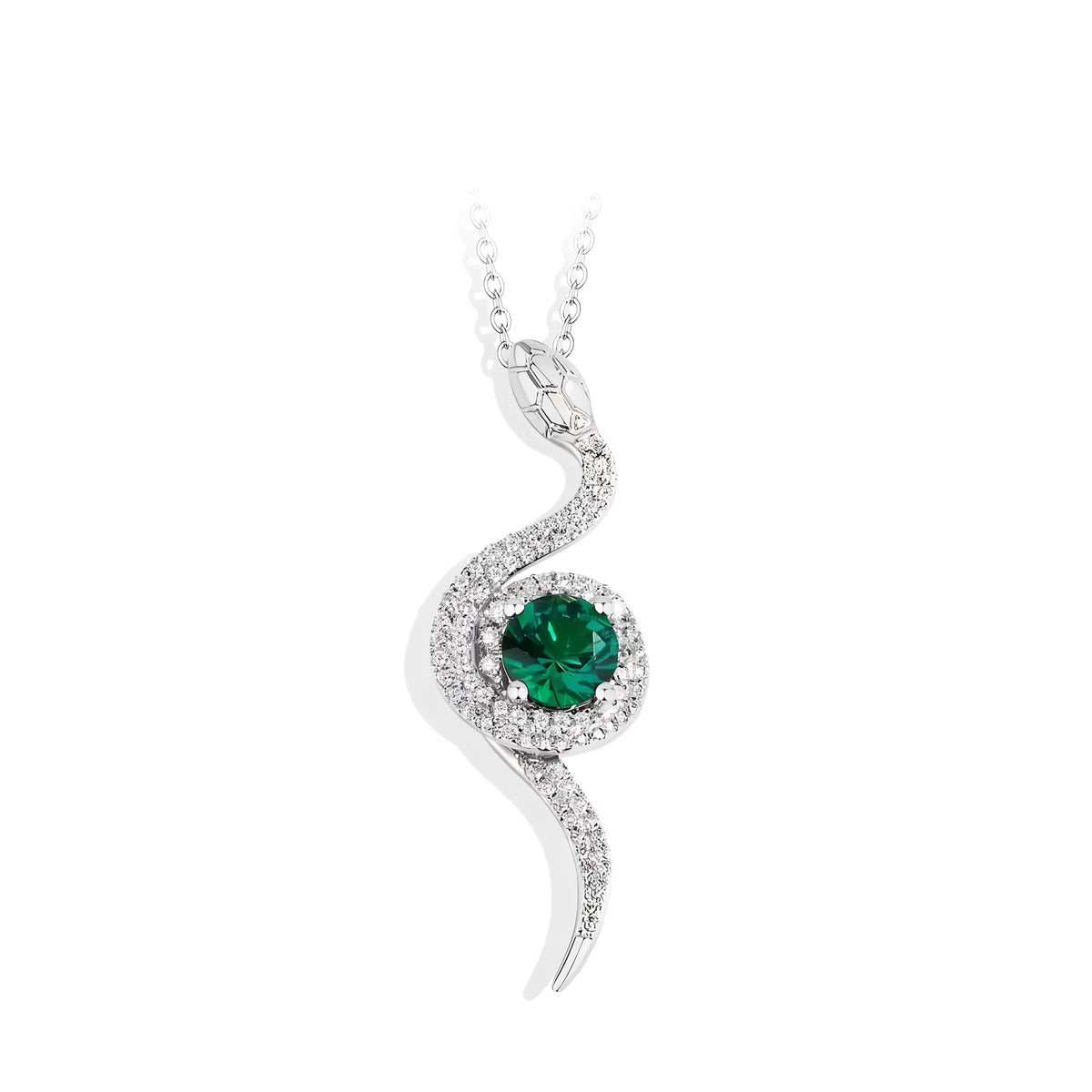Moissanite serpent's eye pendant in 925 sterling silver with a white gold finish, an S-shaped pavé serpent curled around a halo-set round lab-created emerald center stone, on a white background - Sensitive Stones