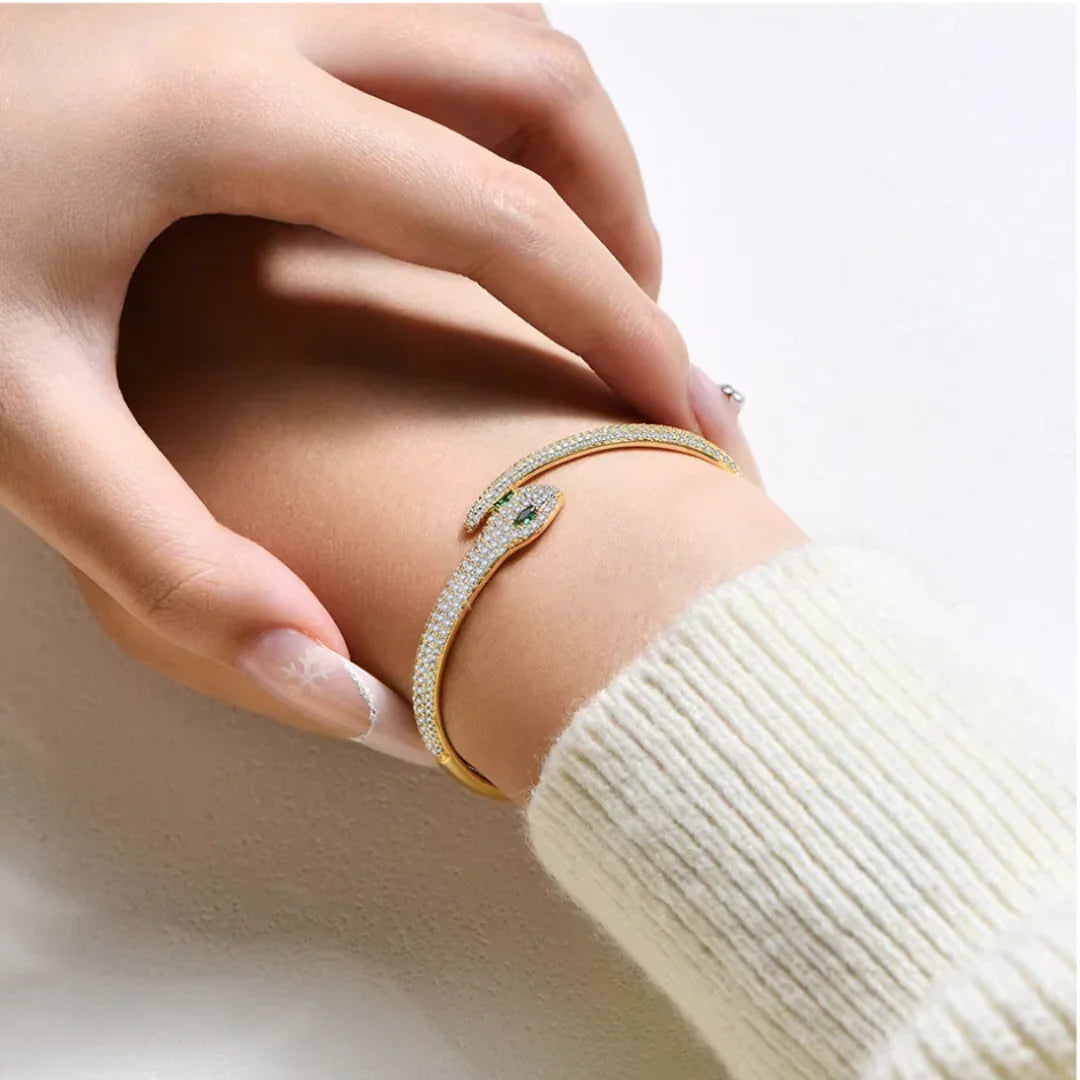 White gold color moissanite snake bracelet with green gemstone accents, pavé setting, 925 silver | Sensitive Stones