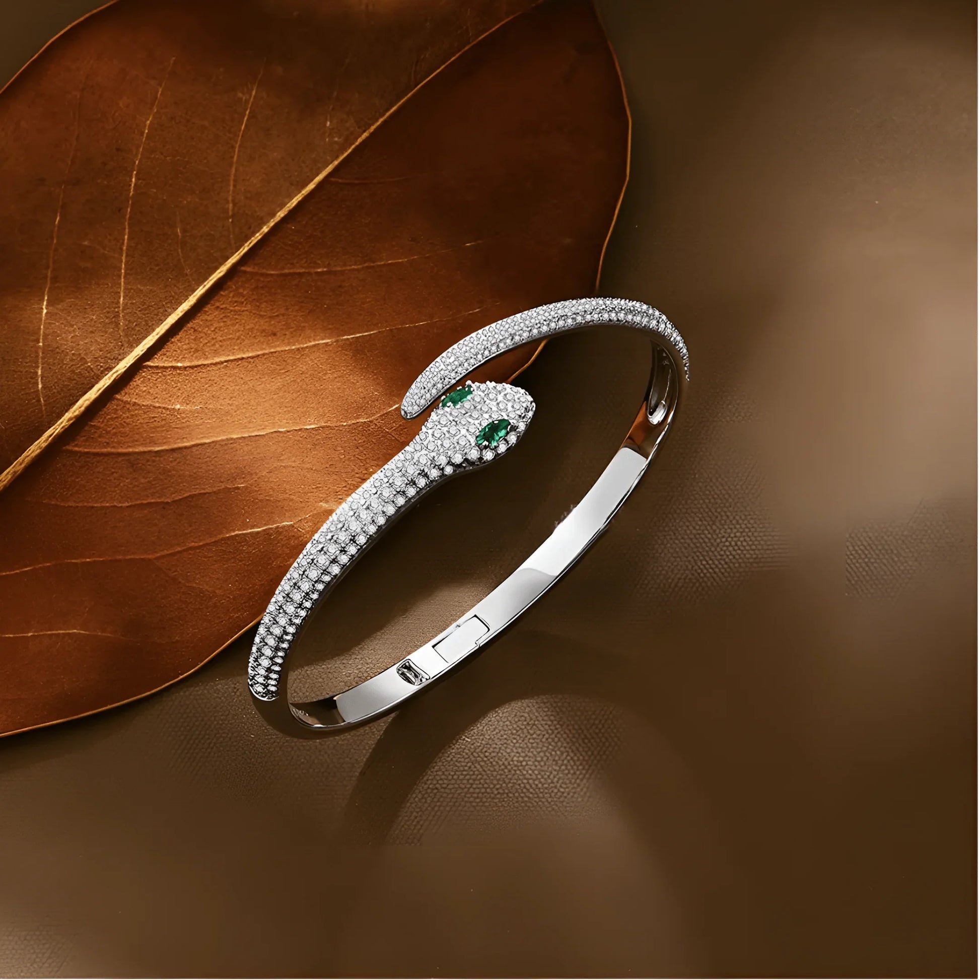 925 sterling silver moissanite snake bracelet with green gemstone accents, pavé setting, finished with 18k white gold | Sensitive Stones