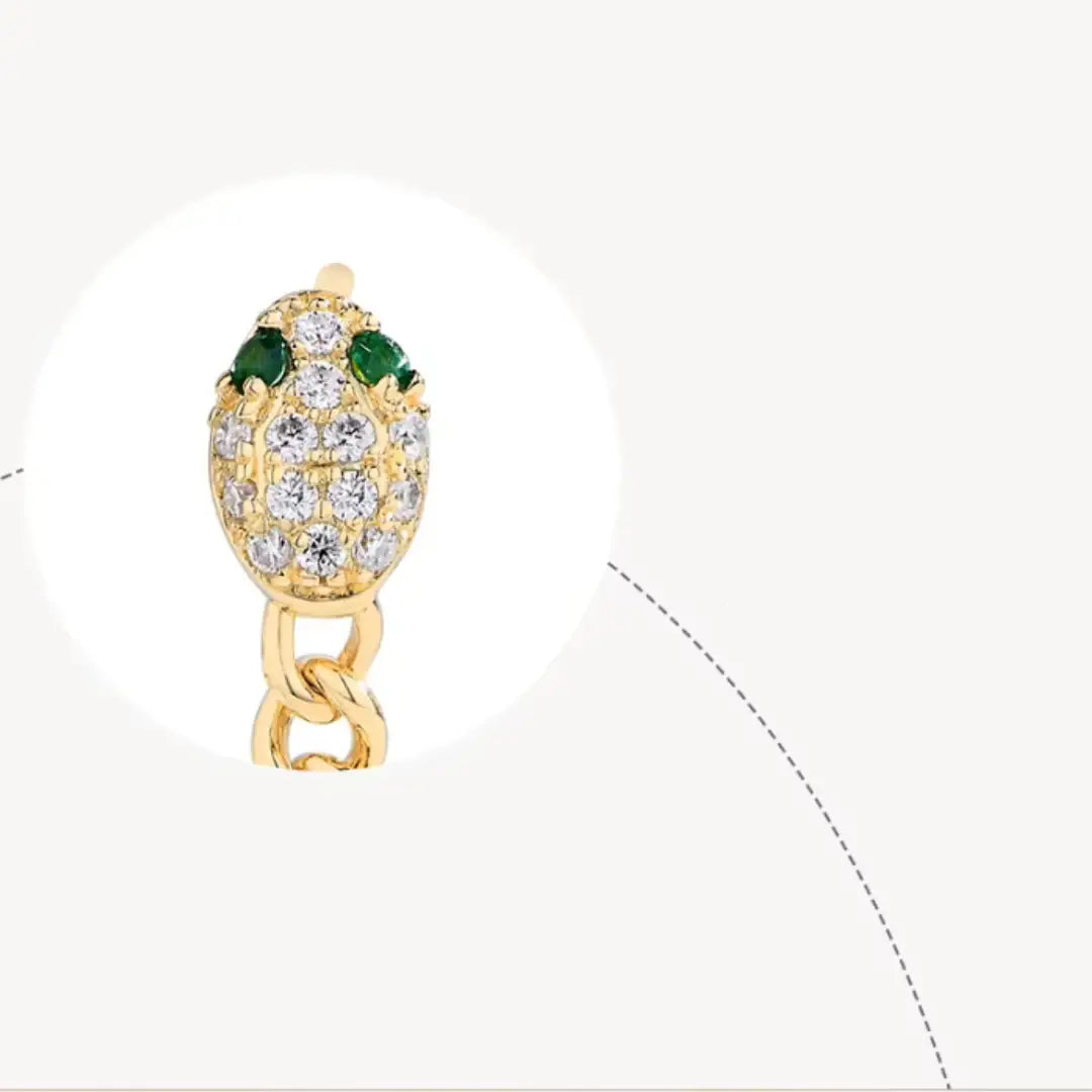 Detailed view of snake chain drop earrings featuring D color VVS1 moissanite stones and green nano gemstones - Sensitive Stones