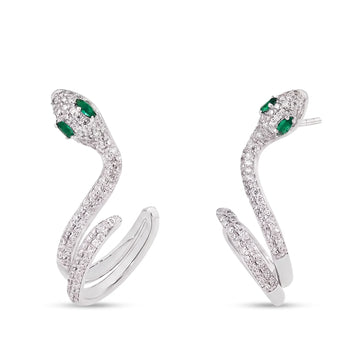 Moissanite snake ear climber earrings in 925 sterling silver with a white gold finish, pavé moissanite and green marquise lab-created emerald eyes, on a white background - Sensitive Stones