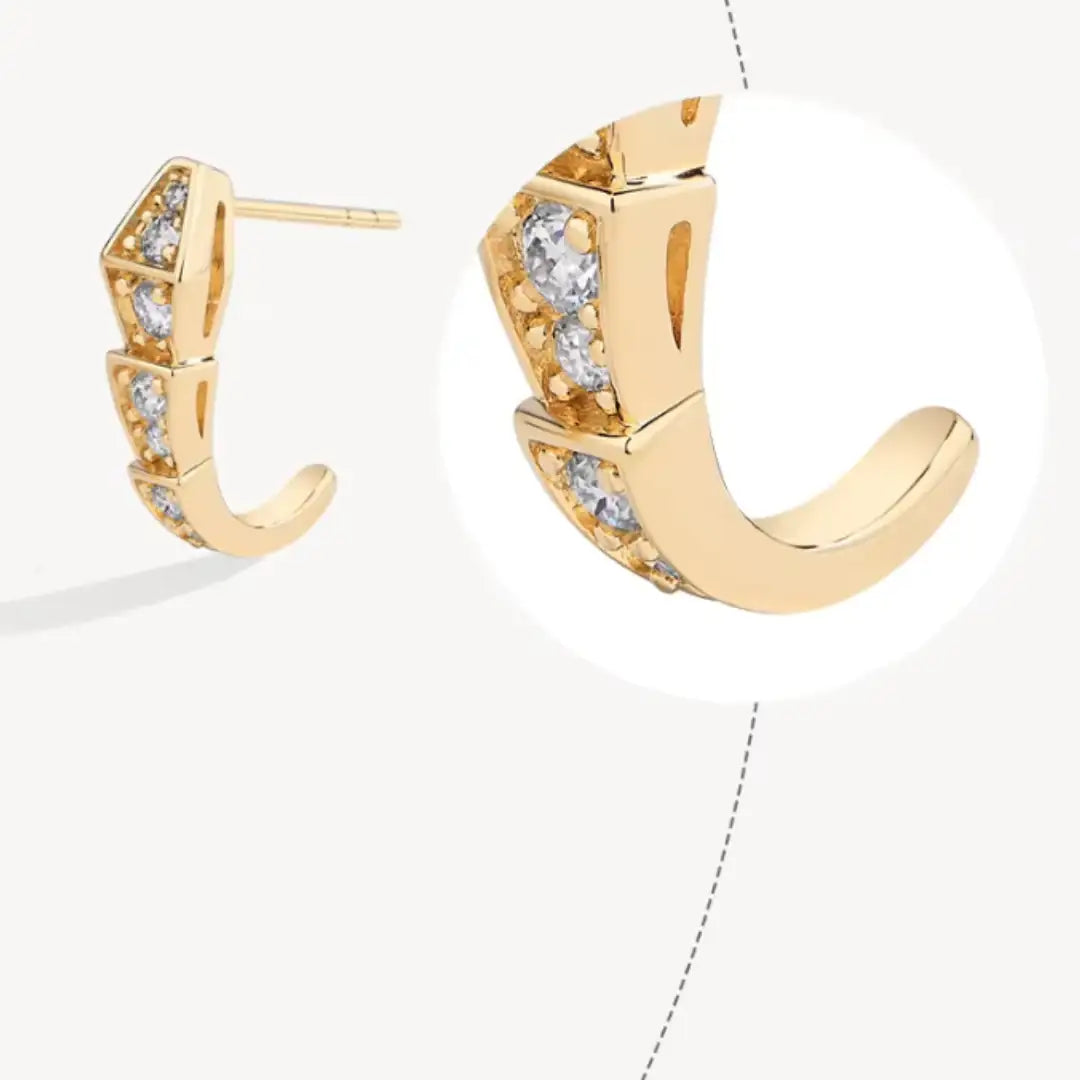 Close-up of yellow gold plated moissanite snake stud earring showing curved segmented design with sparkling stones – Sensitive Stones