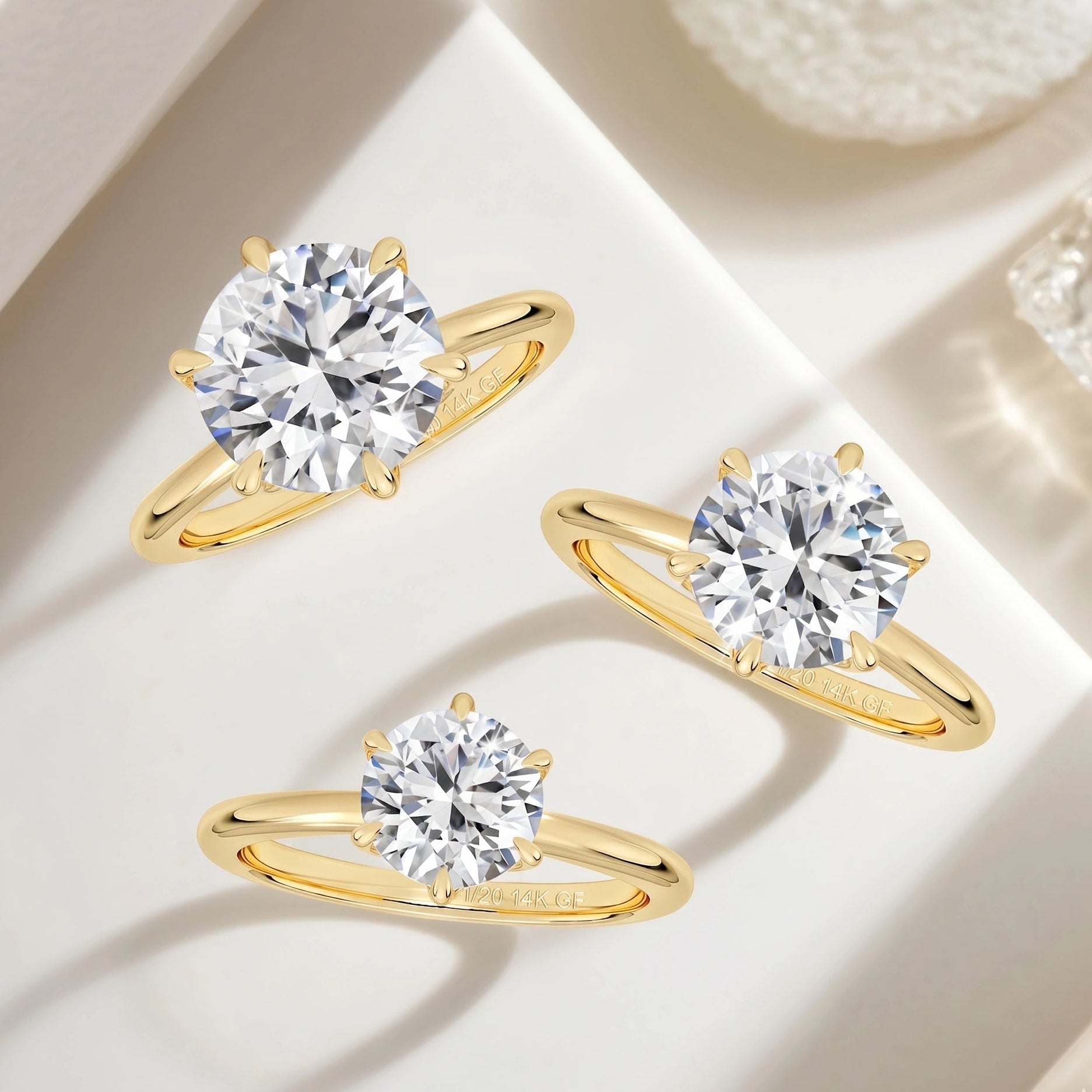 Moissanite solitaire engagement ring in 14K gold filled showing 1ct 2ct and 3ct sizes side by side - Sensitive Stones