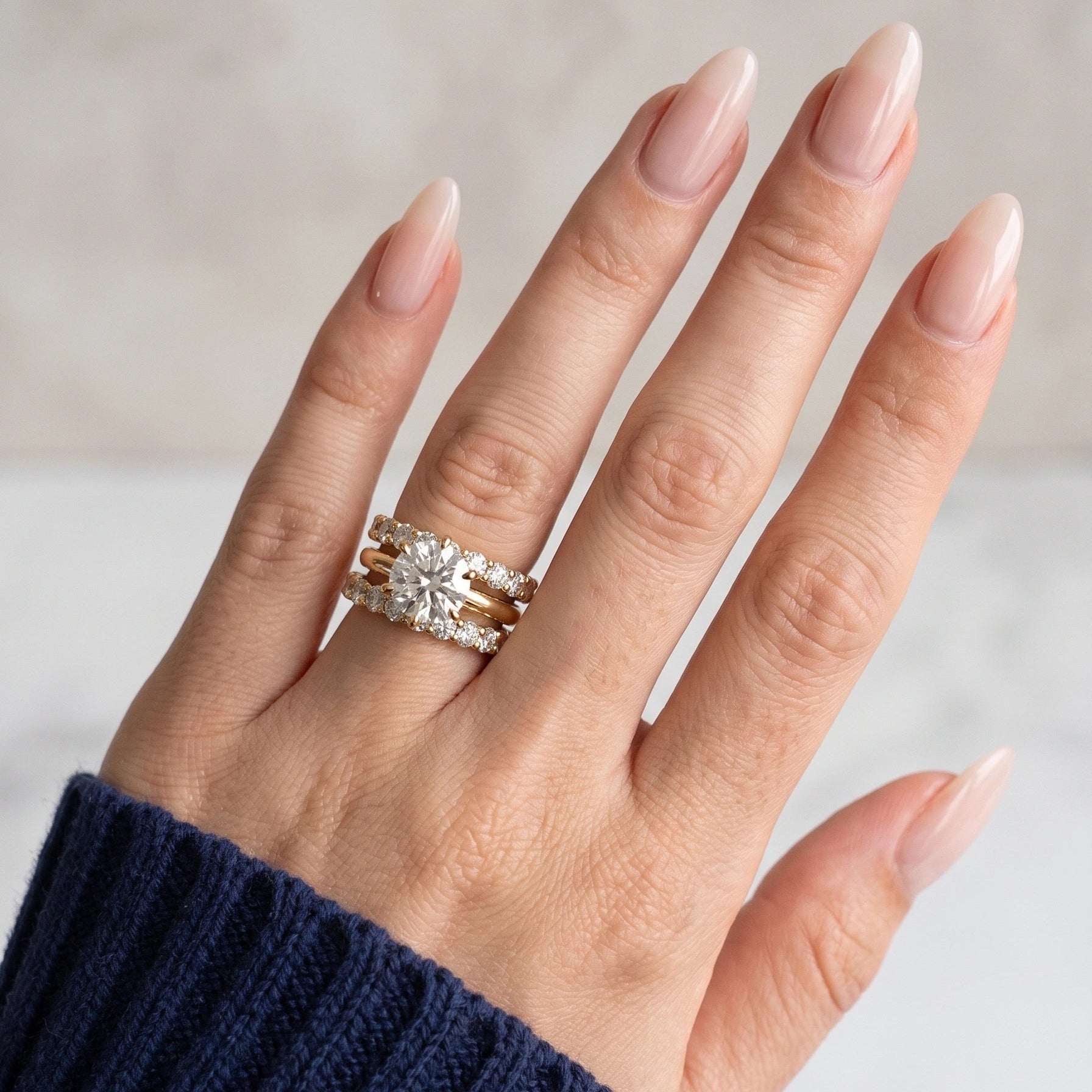 14K gold filled moissanite solitaire engagement ring stacked with pavé band showing layered ring styling - Sensitive Stones