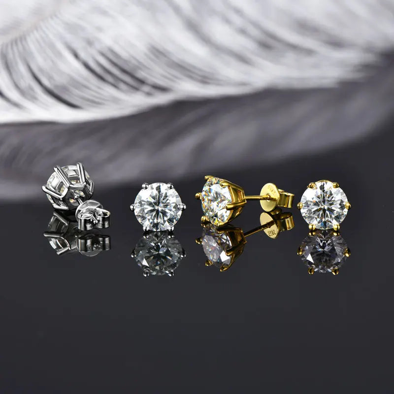 Moissanite solitaire stud earrings in white gold and yellow gold finish, side by side studio comparison showcasing cut and color - Sensitive Stones