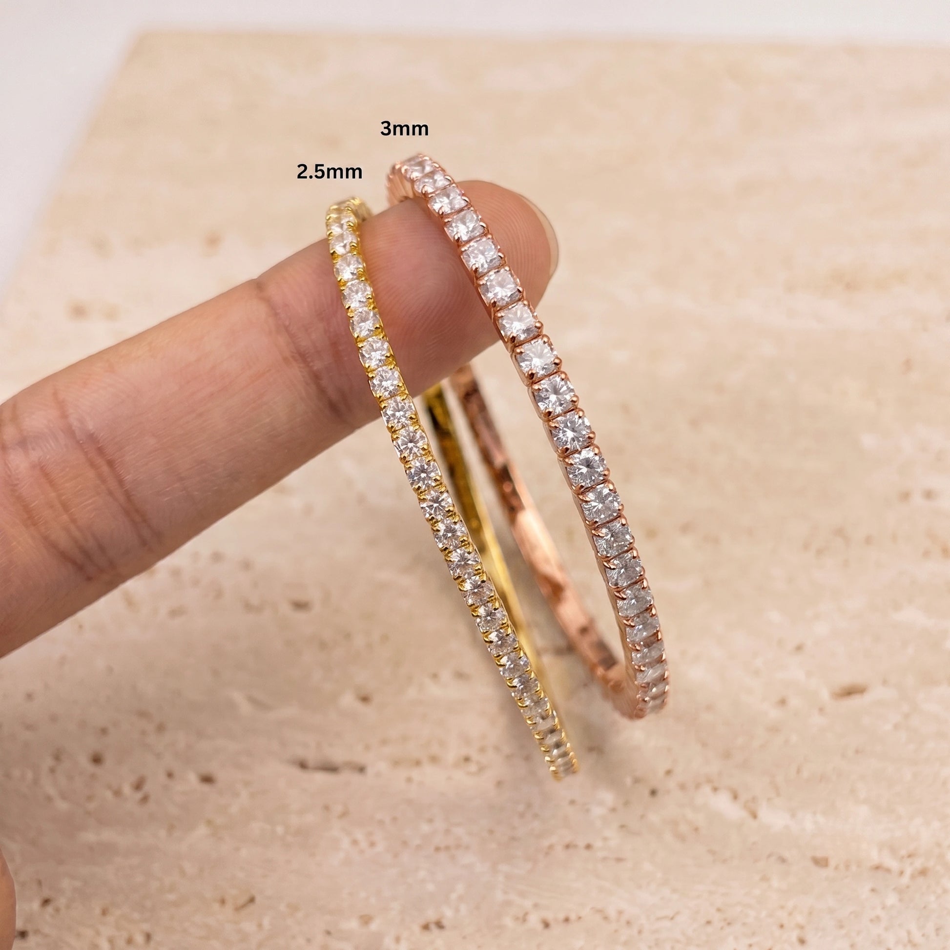 Comparison of 2.5mm and 3mm round moissanite stretch tennis bracelets set in 14k   gold filled and 14k rose gold filled over 925 sterling silver core 