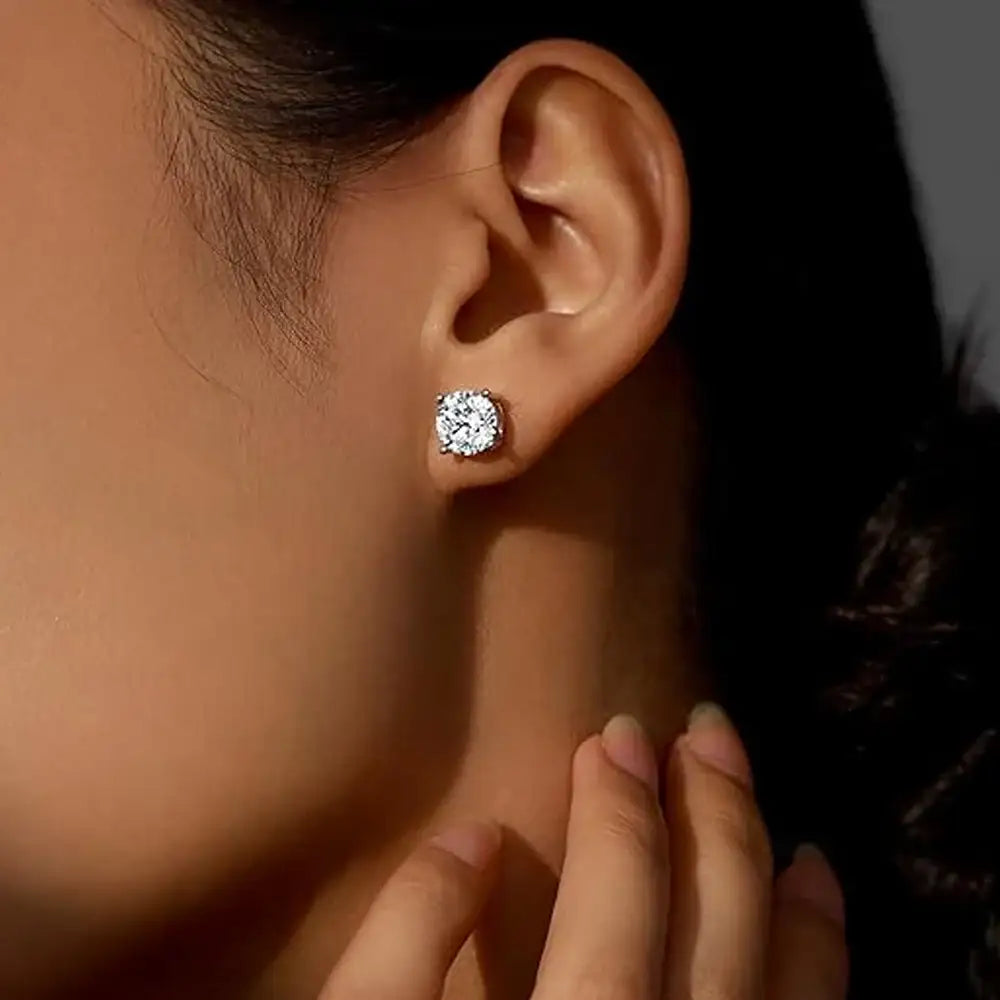 Model wearing moissanite stud earrings in 925 sterling silver – Sensitive Stones