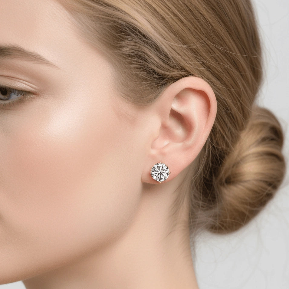Woman wearing elegant 14K gold-filled moissanite stud earrings, demonstrating everyday wearability and timeless style - Sensitive Stones
