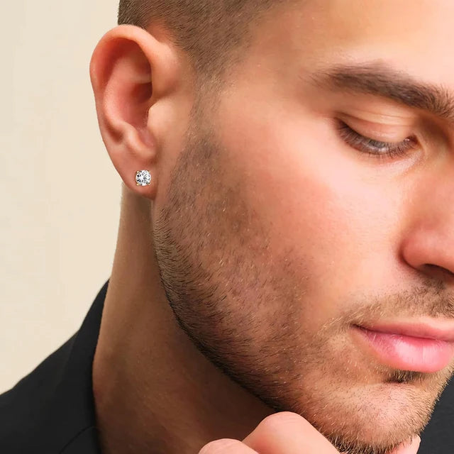 Man wearing white moissanite stud earrings, round cut, 925 sterling silver with 18K gold plating | Sensitive Stones
