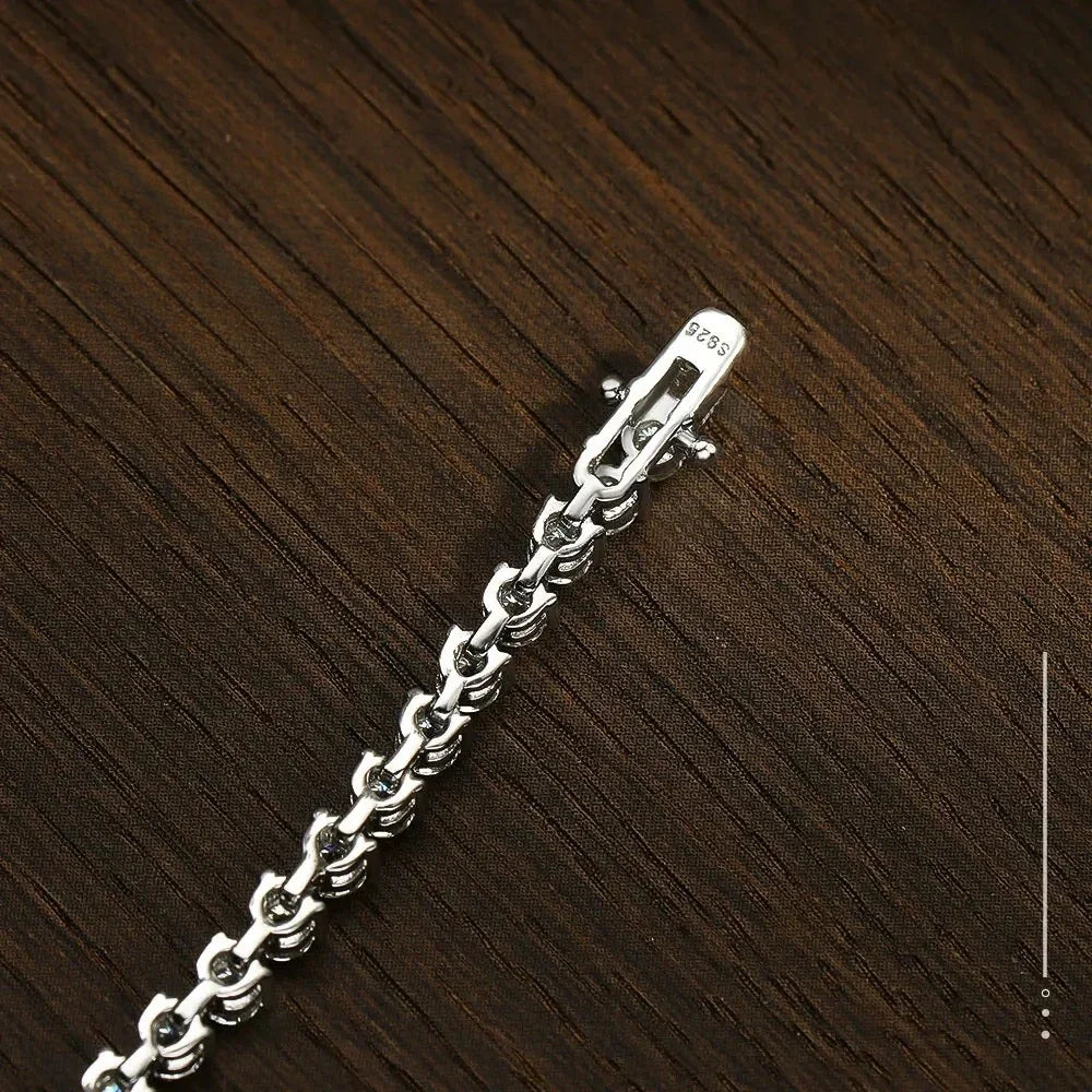 Backside of 3mm moissanite tennis bracelet showing 925 sterling silver stamp and clasp design - Sensitive Stones