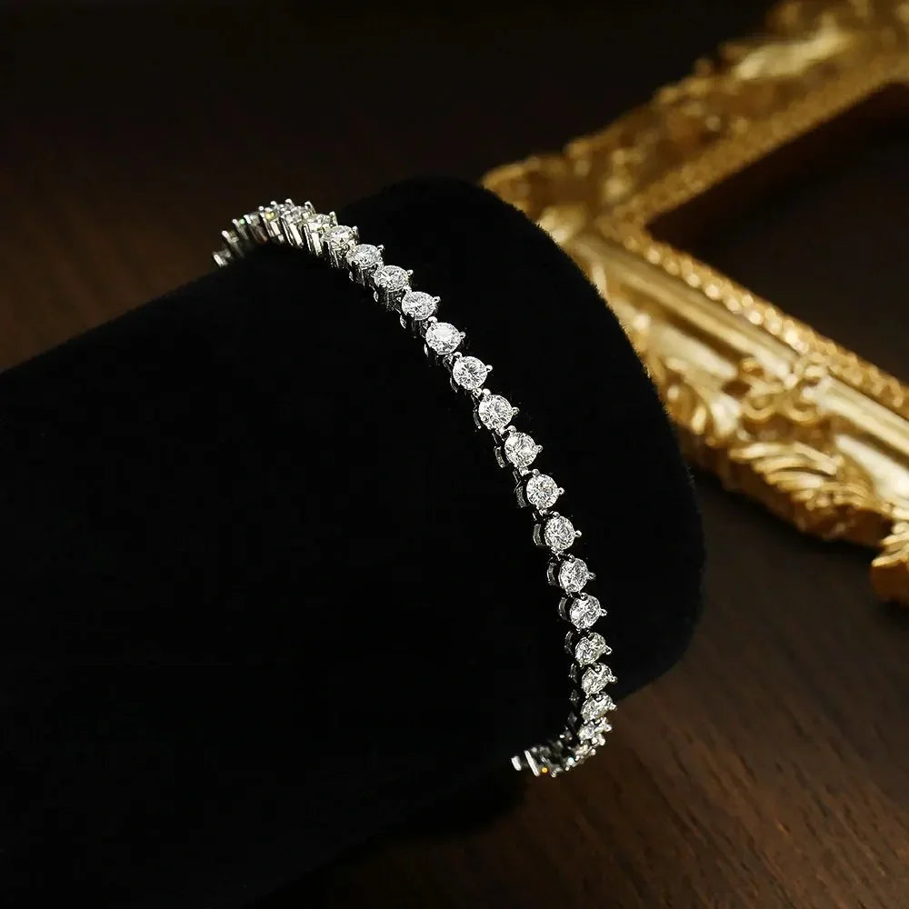 Moissanite tennis bracelet elegantly displayed, 3mm round stones in 3-prong setting - Sensitive Stones