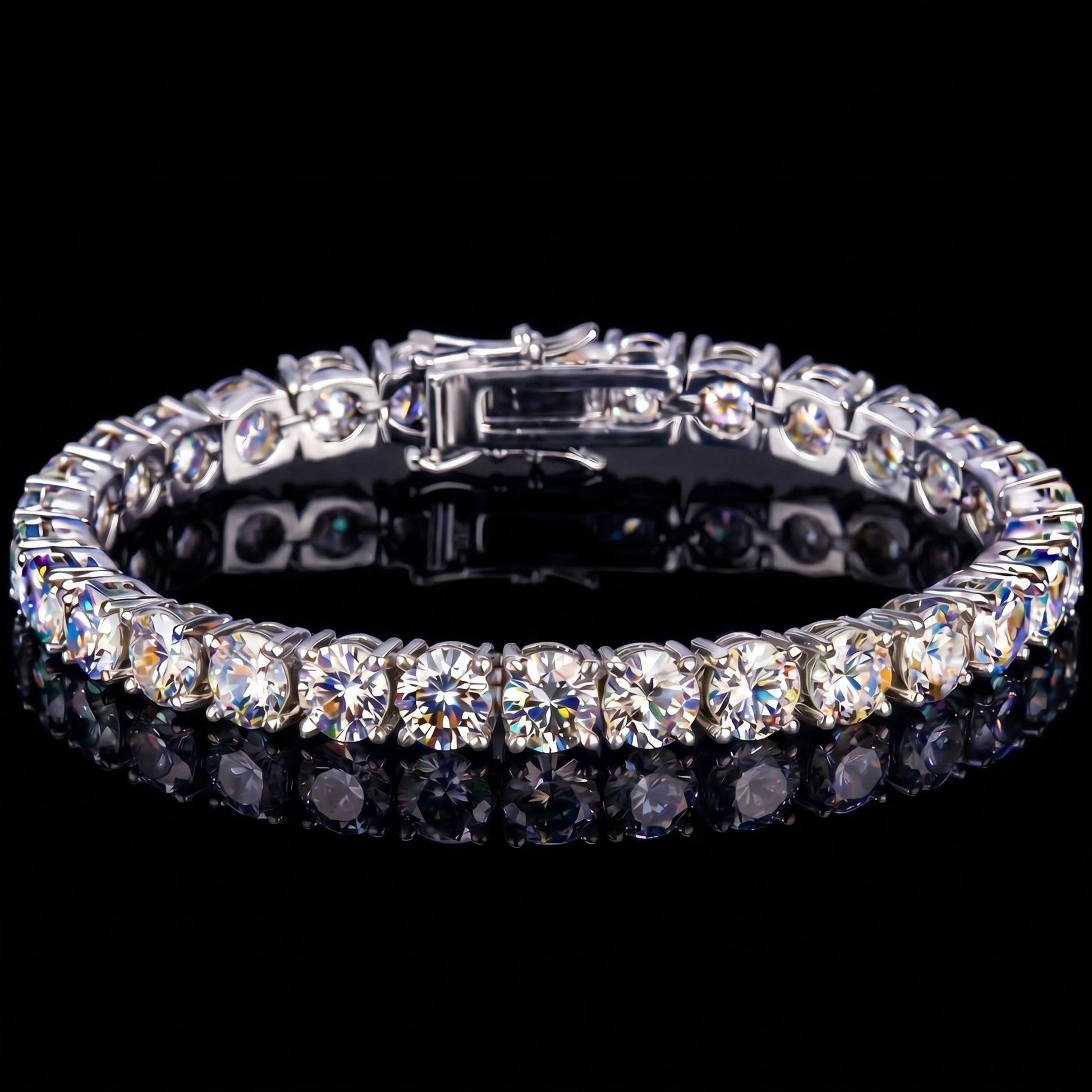 A 5mm moissanite tennis bracelet with clear round-cut stones set in 925 sterling silver with white gold finish, featuring a central clasp, displayed on a reflective black surface against a black background - Sensitive Stones