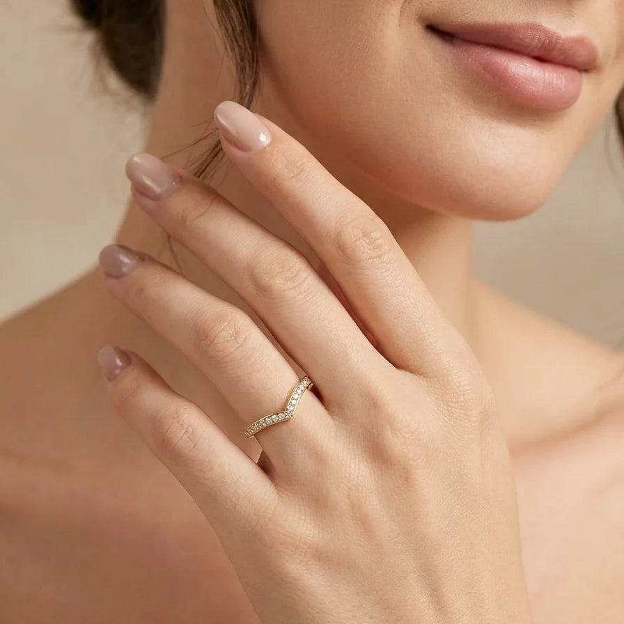 Moissanite V-shaped wedding band in 14K gold filled worn on the hand - Sensitive Stones