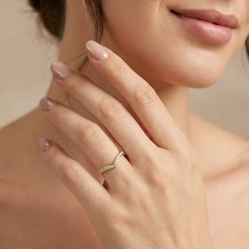 Moissanite V-shaped wedding band in 14K gold filled worn on the hand - Sensitive Stones