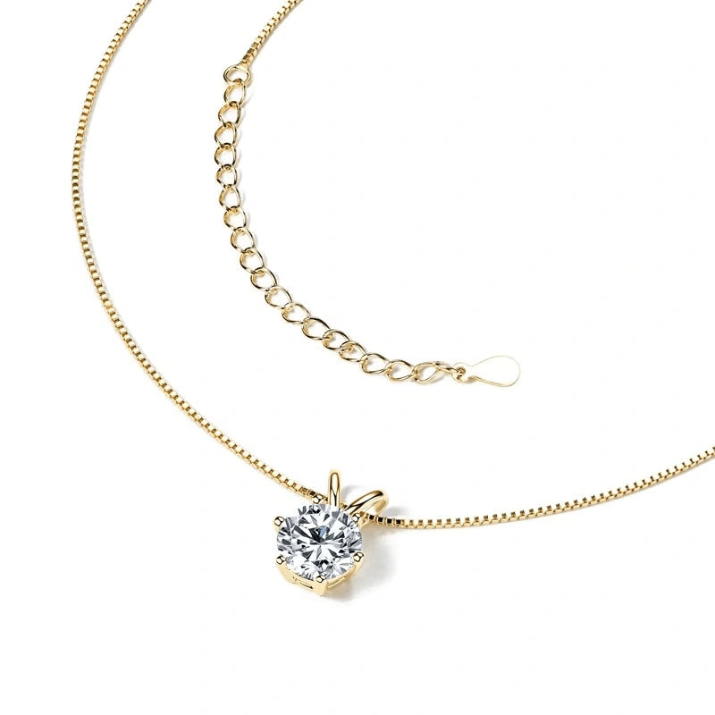 Moissanite necklace with 6-prong solitaire pendant with 18k gold finish on a white background showing the details of chain and extender - Sensitive Stones