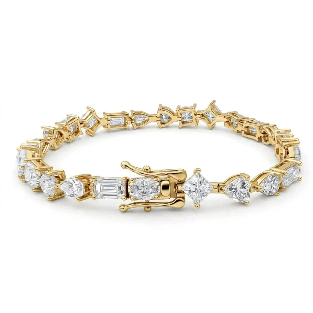 Multi shape moissanite tennis bracelet in 18K yellow gold on a white background - Sensitive Stones