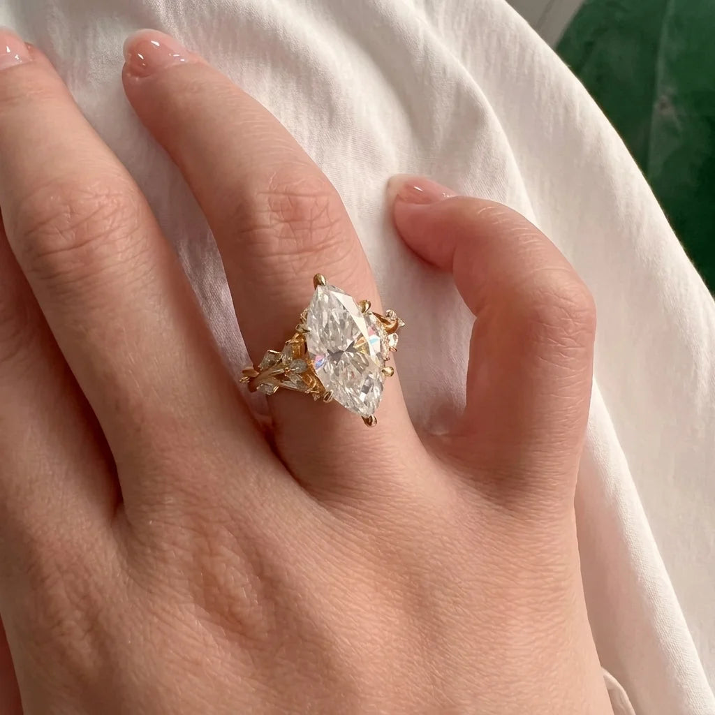 Marquise moissanite vine engagement ring in 14K gold filled worn on the ring finger - Sensitive Stones