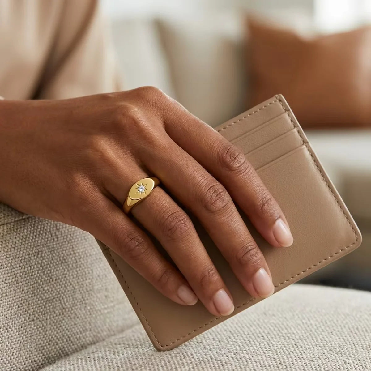 North star signet ring in 14K gold filled worn on the hand, the small oval face sitting flat against the finger - Sensitive Stones