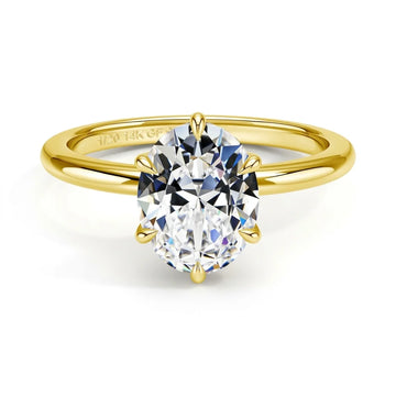 Oval cut moissanite engagement ring in 14K gold filled with a 2ct D color VVS1 stone in a six prong setting