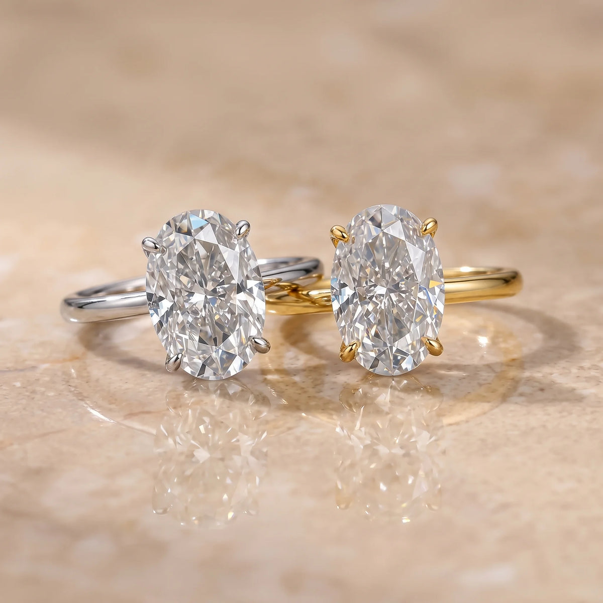 Oval cut moissanite solitaire ring shown in both white gold and yellow gold finishes side by side each sold separately - Sensitive Stones