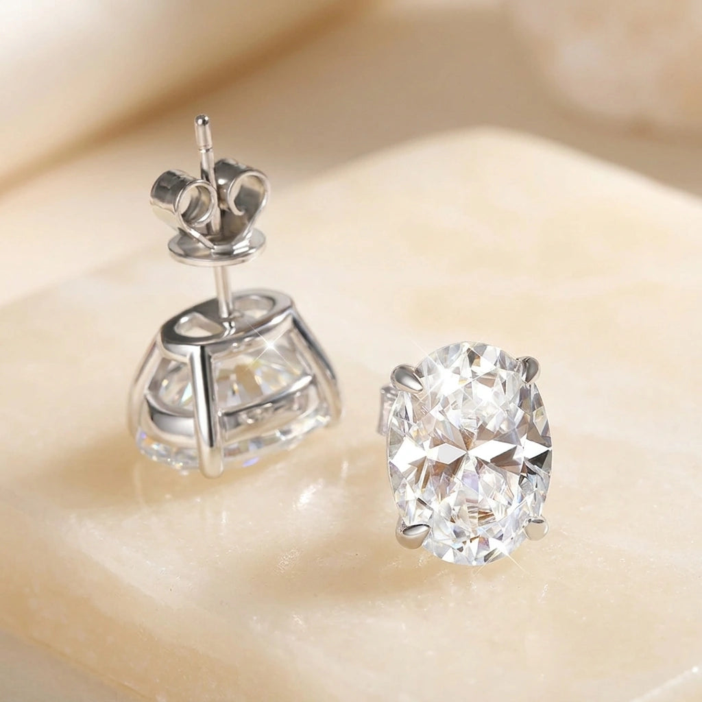 Oval cut moissanite stud earring showing 4 prong basket setting and push back post - Sensitive Stones