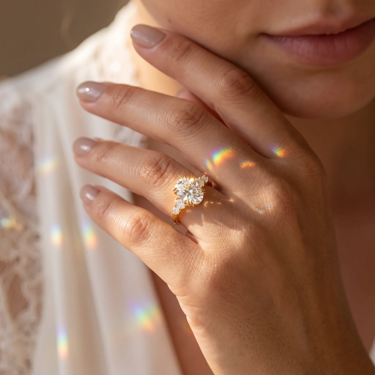 Woman wearing the 14K gold filled oval moissanite engagement ring with side stones - Sensitive Stones